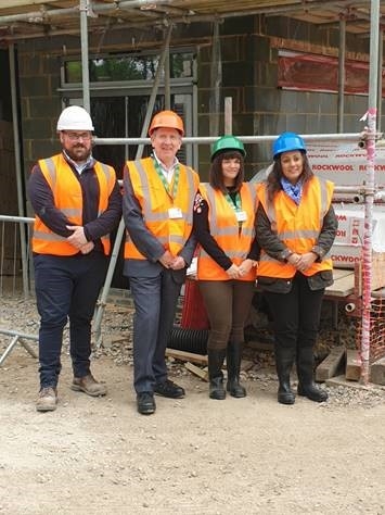 L-R: Nick Kehoe, Site Manager (Westridge Construction); Rob Woolley, CEO Hospice In The Weald; Holly Cowen, Head Nurse for the Cottage Hospice; and, Nusrat Ghani MP.